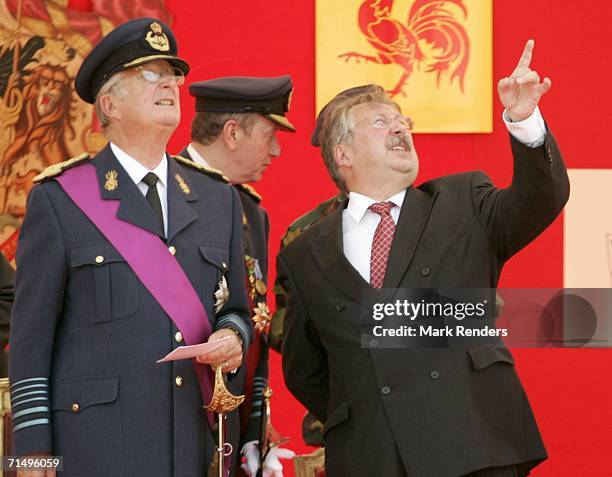 King Albert of Belgium and Defence Minister Flahaut attend Belgian National Day celebrations on July 21, 2006 in Brussels, Belgium.