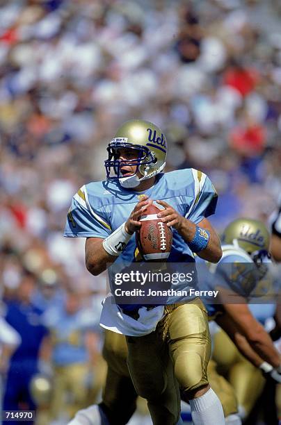 Quarterback Ryan McCann of the UCLA Bruins looks to throw the ball during the game against the Alabama Crimson Tide at the Rose Bowl in Pasadena,...