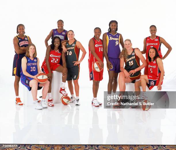 As members of the all decade team, standing, Tamika Catchings of the Indiana Fever, Yolanda Griffith of the Sacramento Monarchs, Sue Bird of the...