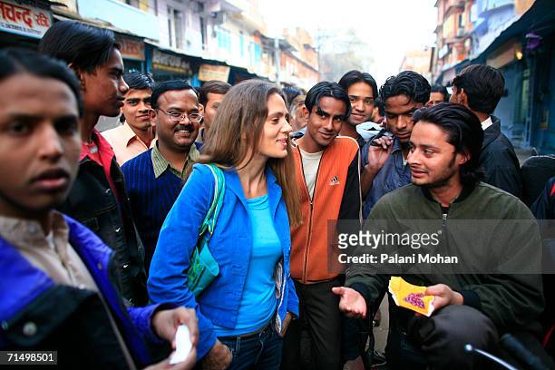 French Jeweler designer Marie Helene De Taillac along with Gauri Shankar Dangayach a worker at the Gem palace talk to jem dealers on the streets on...