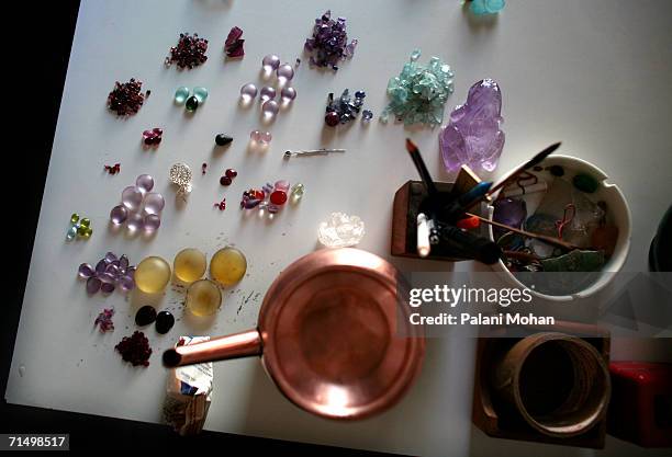 Gem stones on a work table at the Gem palace Jewellers on January 10, 2006 in Jaipur, India. Jaipur is famous for its precious and semi-precious...