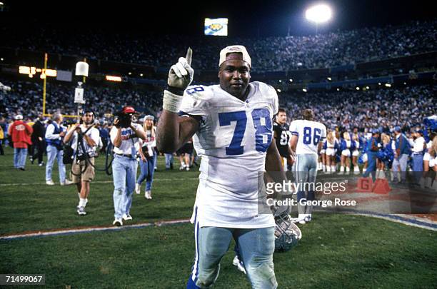 Defensive end Leon Lett of the Dallas Cowboys celebrates after the Cowboys victory over the Pittsburgh Steelers in Super Bowl XXX at Sun Devil...