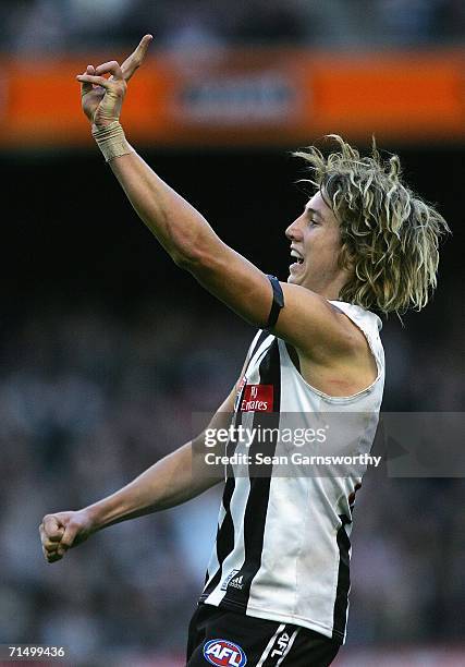 Dale Thomas for Collingwood celebrates kicking a goal during the round 16 AFL match between the Collingwood Magpies and the West Coast Eagles at the...