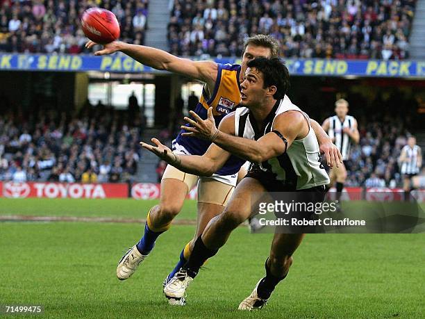 Chris Tarrant of the Magpies in action during the round 16 AFL match between the Collingwood Magpies and the West Coast Eagles at the Telstra Dome...