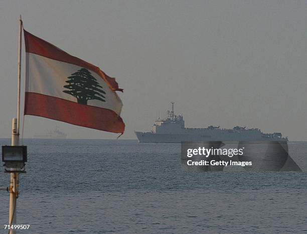 Lebanese flag waves as as American families are evacuated by a U.S. Marine helicopter ship in the Mediterranean Sea on July 21, 2006 in Beirut,...