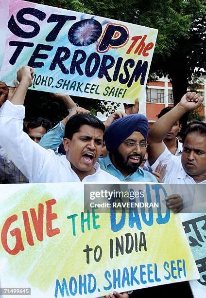 Activists from the All India Muslim Youth Anti-Terrorist Front shout anti-Pakistan President Pervez Musharraf slogans during a protest in New Delhi,...