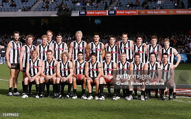 The Magpies pose for a team photo as part of Heritage round prior to the start of the round 16 AFL match between the Collingwood Magpies and the West...