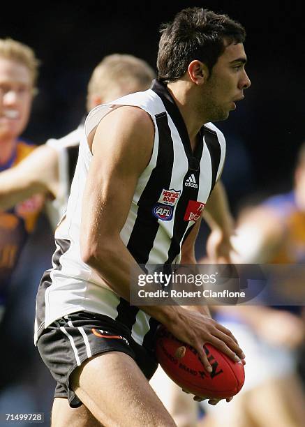 Chris Egan of the Magpies in action during the round 16 AFL match between the Collingwood Magpies and the West Coast Eagles at the Telstra Dome July...