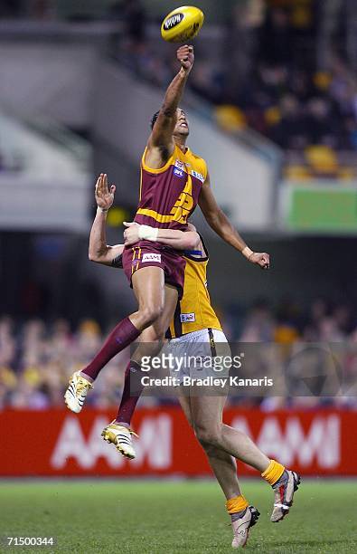 Jason Roe of the Lions in action during the round 16 AFL match between the Brisbane Lions and the Hawthorn Hawks at the Gabba on July 22, 2006 in...