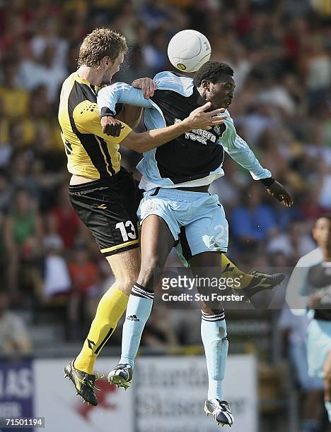 Shola Ameobi of Newcastle goes up for a header with Frode Kippe of Lillestrom SK during the second leg of the Intertoto Cup between Lillestrom SK and...