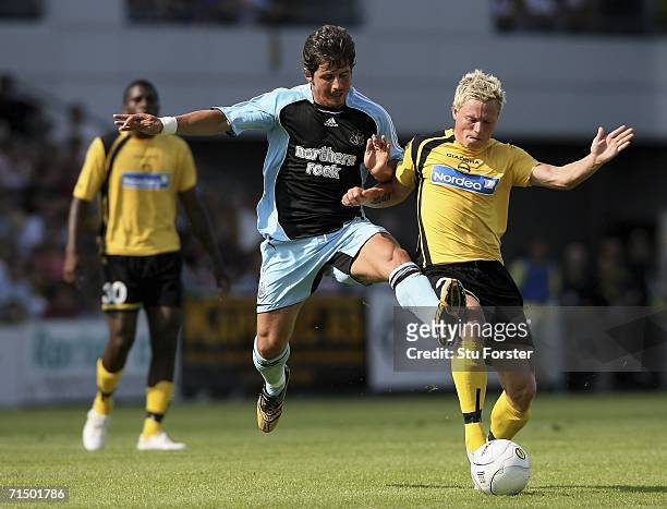 Newcastle palyer Emre attempts to tackle Lillestrom SK player Bjorn Helge Riise during the second leg of the Intertoto Cup between Lillestrom SK and...