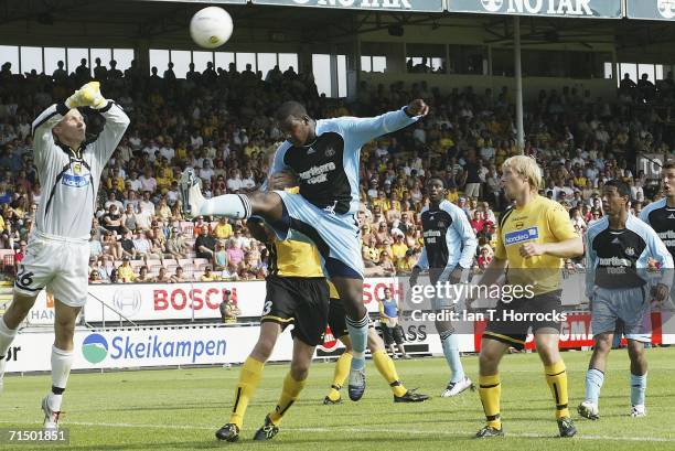 Titus Bramble of Newcastle competes with Otto Fredrikson of Lillestrom SK during the UEFA Intertoto Cup third round Second leg match between...