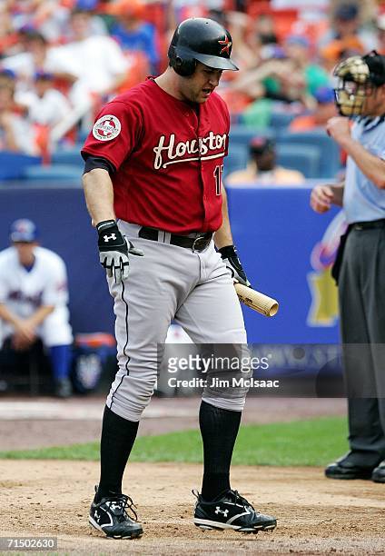 Lance Berkman of the Houston Astros walks back to the dugout after striking out in the eighth inning against the New York Mets on July 22, 2006 at...