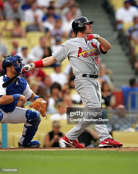 Jim Edmonds of the St. Louis Cardinals hits a home run against the Los Angeles Dodgers in the second inning on July 22, 2006 at Dodger Stadium in Los...