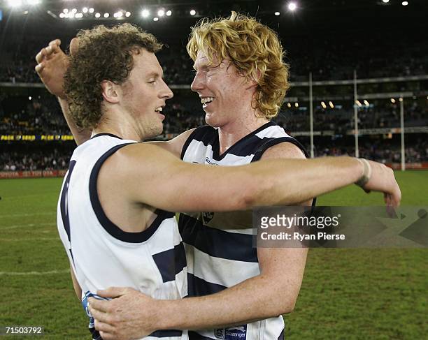 James Kelly and Cameron Ling of the Cats celebrate after the round 16 AFL match between the Geelong Cats and the Western Bulldogs at the Telstra Dome...
