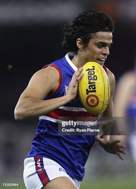 Jordan McMahon of the Bulldogs in action during the round sixteen AFL match between the Geelong Cats and the Western Bulldogs at the Telstra Dome...