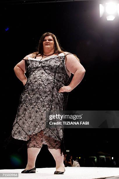 Contestant of the beauty contest "Miss Cicciona" rehearses before the competition, held every year at Forcoli near Pisa in Tuscany, 23 July 2006. AFP...