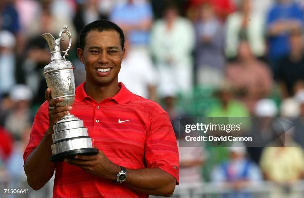 Tiger Woods of USA poses with the claret jug following his two shot victory at the end of the final round of The Open Championship at Royal Liverpool...