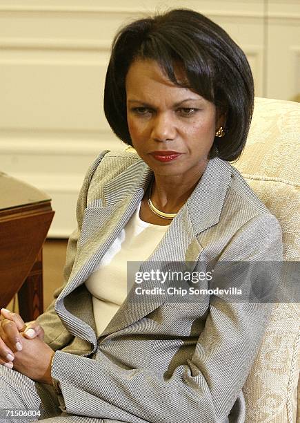 Secretary of State Condoleezza Rice attends a meeting in the Oval Office at the White House July 23, 2006 in Washington, DC. Rice and US President...