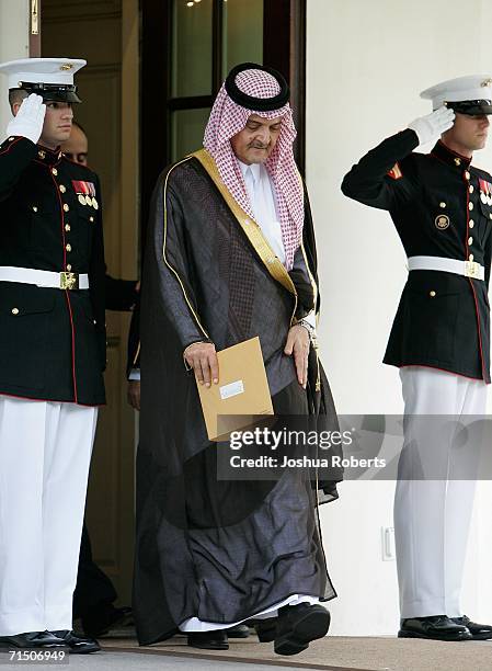 Senior Foreign Minister Prince Saud al-Faisal leaves the West Wing after meeting with President George W. Bush and Secretary of State Condoleezza...