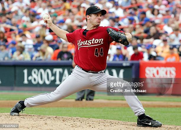 Roy Oswalt of the Houston Astros delivers a pitch against the New York Mets on July 23, 2006 at Shea Stadium in the Flushing neighborhood of the...