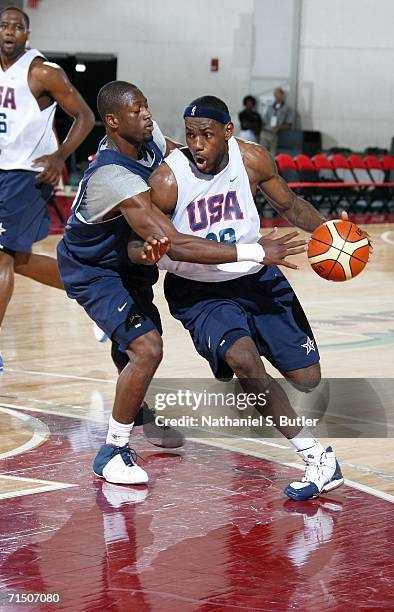 LeBron James drives against Dwyane Wade during USA Senior Mens National Team practice on July 23, 2006 at the Cox Pavilion in Las Vegas, Nevada. NOTE...