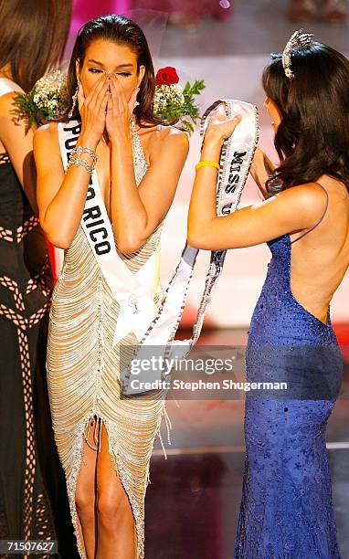 Miss Puerto Rico Zuleyka Rivera Mendoza is crowned Miss Universe by Miss Universe 2005 Natalie Glebova during the Miss Universe 2006 pageant at the...