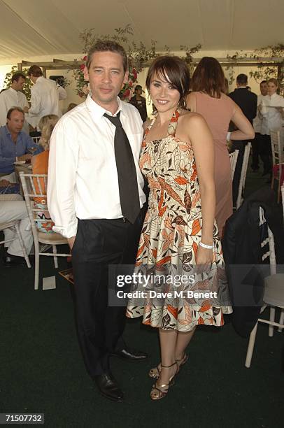 Actors Dexter Fletcher and Emma Pierson attend the final of the 2006 Veuve Clicquot Gold Cup for the British Open Polo Championship on July 23, 2006...