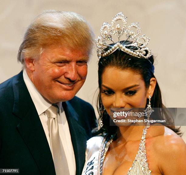 Miss Puerto Rico Zuleyka Rivera Mendoza poses with Donald Trump on stage after being named Miss Universe during the Miss Universe 2006 pageant at the...