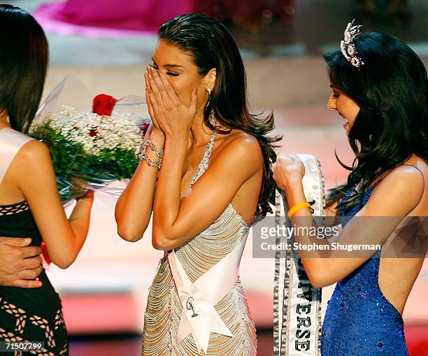 Miss Puerto Zuleyka Rivera Mendoza is crowned Miss Universe by Miss Universe 2005 Natalie Glebova during the Miss Universe 2006 pageant at the Shrine...