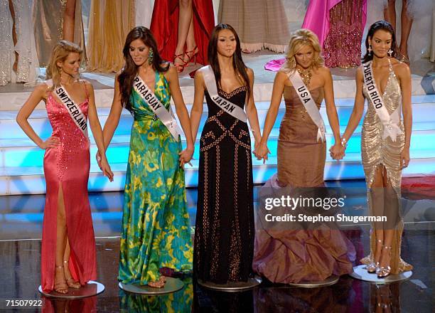 The top five contestants Miss Switzerland Lauriane Gillieron, Miss Paraguay Lourdes Arevalos, Miss Japan Kurara Chibana, Miss USA Tara Conner and...
