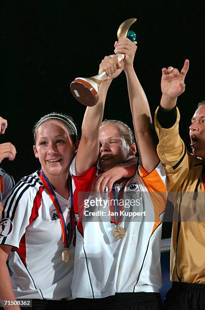 Nadine Kessler , Monique Kerschowski and Romina Holz celebrate after winning the Women's U19 Europen Championship match between Germany and France at...