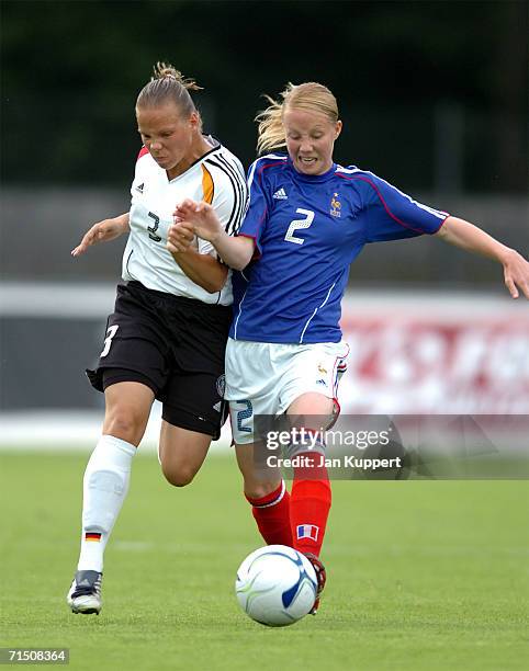 Monique Kerschowski of Germany challenges Elodie Cordier of France during the Women's U19 Europen Championship match between Germany and France at...
