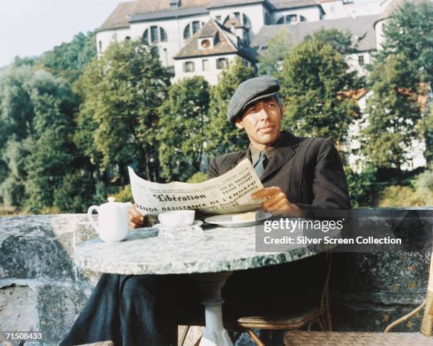 American actor James Coburn as Flying Officer Louis 'The Manufacturer' Sedgwick in classic World War II drama 'The Great Escape', directed by John...