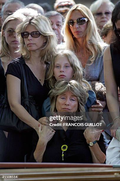 French film director Gerard Oury's daughter Daniele Thompson attends her father's funeral with relatives, 24 July 2006 at the Montparnasse cemetery...