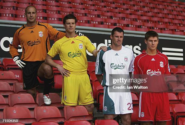 Pepe Reina, Xabi Alonso, Jamie Carragher, Steven Gerrard showing on the new kits during the Liverpool FC Adidas Kit Launch Press Conference at...