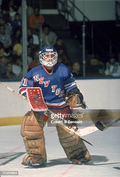 Canadian professional ice hockey player Ron Scott, Goalie of the New York Rangers, guards the goal during a road game against the New York Islanders,...