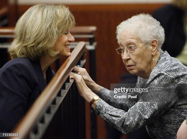 Mary Parnham , wife of defense attorney George Parnham chats with Jutta Karin Kennedy , mother of Andrea Yates, prior to closing arguments in Yates'...