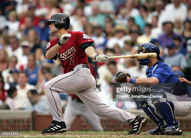 Chris Burke of the Houston Astros swings at the pitch during the game against the Chicago Cubs on July 20, 2006 at Wrigley Field in Chicago, Illinois.