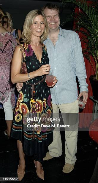 Rob Stringer and Julia Carling attend the opening party of High Road House at the new club July 25, 2006 in London, England.