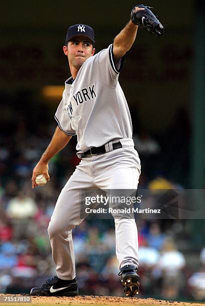 Mike Mussina of the New York Yankees delivers a pitch in the first inning against the Texas Rangers on July 25, 2006 at Ameriquest Field in...