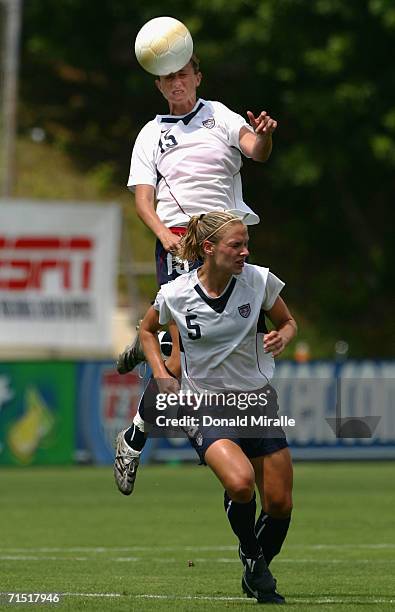 Marci Miller of Team USA jumps to head the ball against Team Ireland during the international women's soccer game held on July 23, 2006 at Torero...