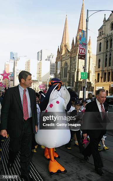 Victorian Premier Steve Bracks and Tony Beddison AO , Chairman of the 2007 World Swimming Championships Corporation meet the as yet unnamed Penguin...