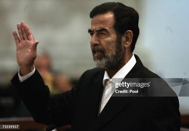 Saddam Hussein Returns To Court In Baghdad Photos and Premium High Res Saddam Hussein Returns To Court In Baghdad Photos and Premium High Res