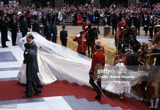 Lady Diana Spencer, wearing a wedding dress designed by David and Elizabeth Emanuel and the Spencer family Tiara, prepares to enter St. Paul's...