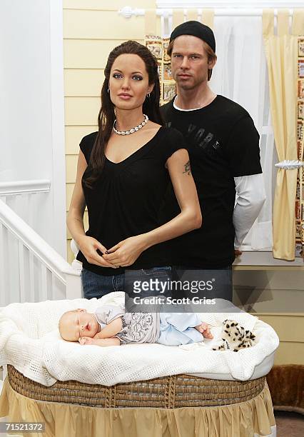 The Shiloh Nouvel Jolie Pitt wax figure debuts at Madame Tussauds with her parents wax figures, Angelina Jolie and Brad Pitt, on July 26, 2006 in New...