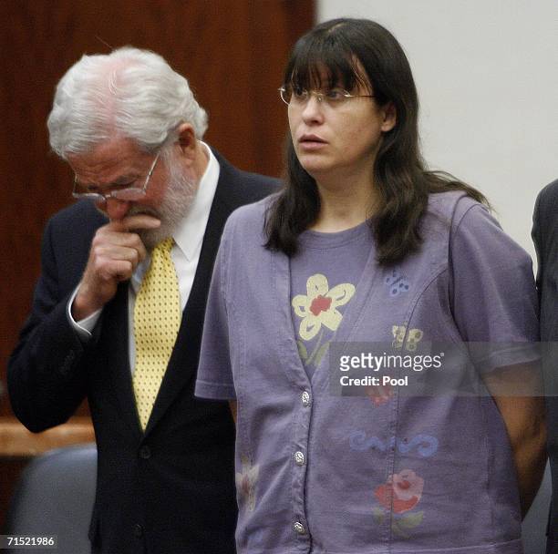 Andrea Yates and her attorney George Parnham react to the not guilty by reason of insanity verdict in her retrial July 26, 2006 in Houston. Yates...