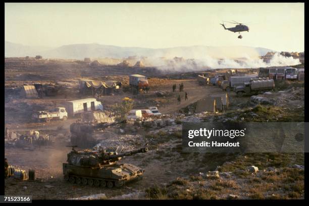 In this archive image provided by the Israeli Government Press Office , an Israeli Air Force helicopter ferries supplies to an army encampment during...