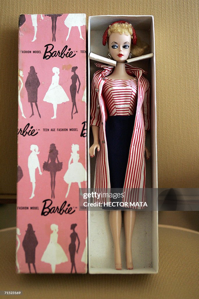 A Barbie Doll is displayed at the room o