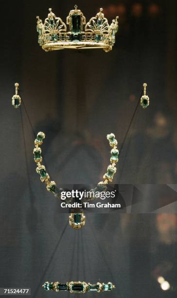 An aquamarine jewel set, a coronation gift from Brazil, is displayed in an exhibition of Queen Elizabeth II's dresses and jewels in the State Rooms...